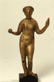 Bronze naked woman holding an apple in her right hand and unknown object in her left hand